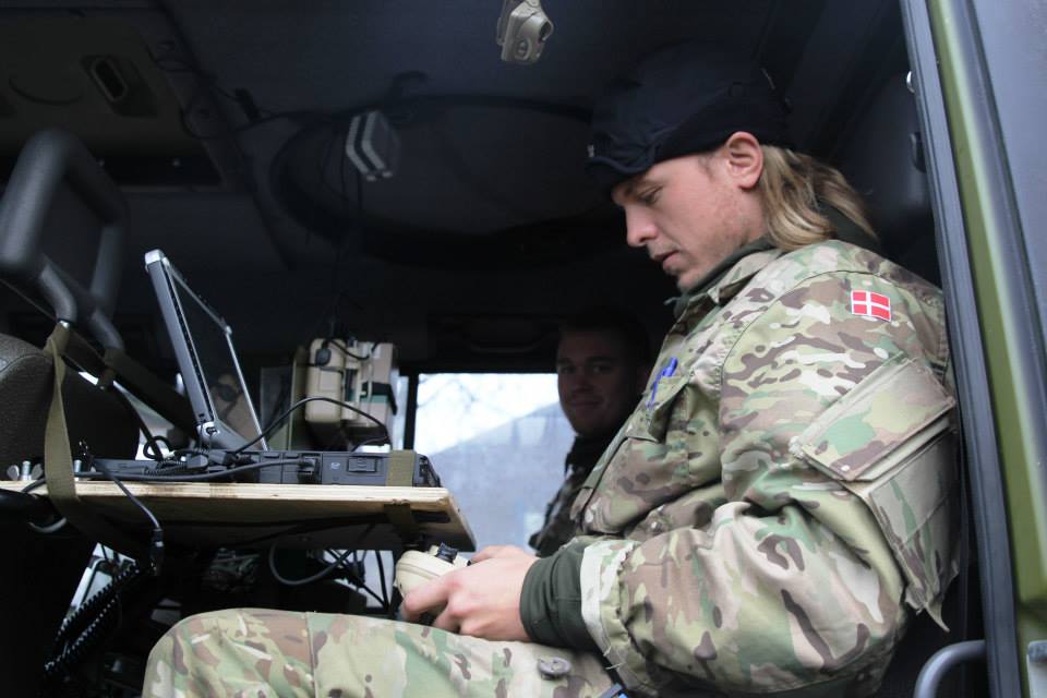 A Danish service member operates a reconnaissance drone.