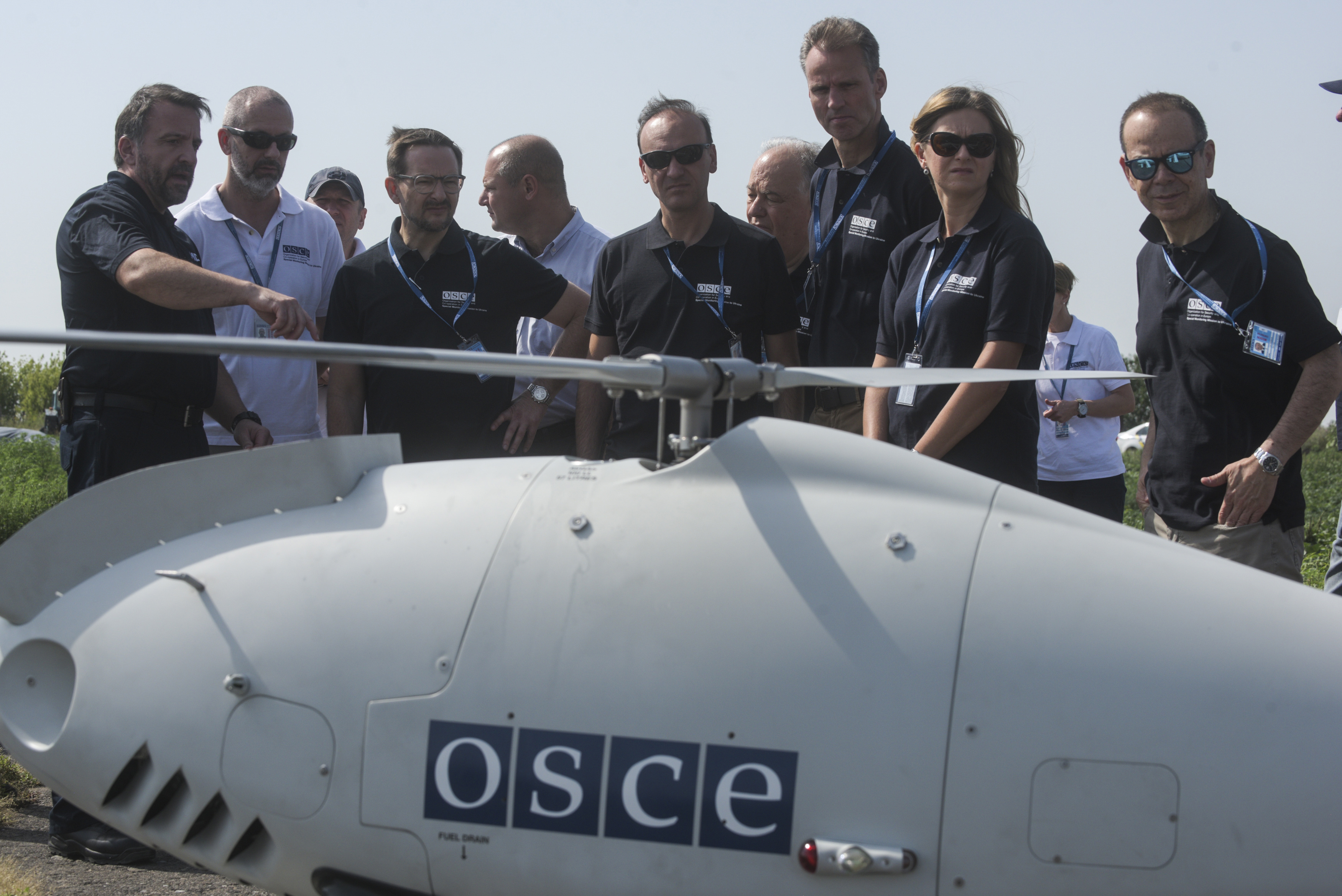 Members of the Special Monitoring Mission present a long-range Unmanned aerial vehicle (UAV) to OSCE Secretary General Thomas Greminger during his visit in eastern Ukraine, Stepanivka, 27 July 2018.